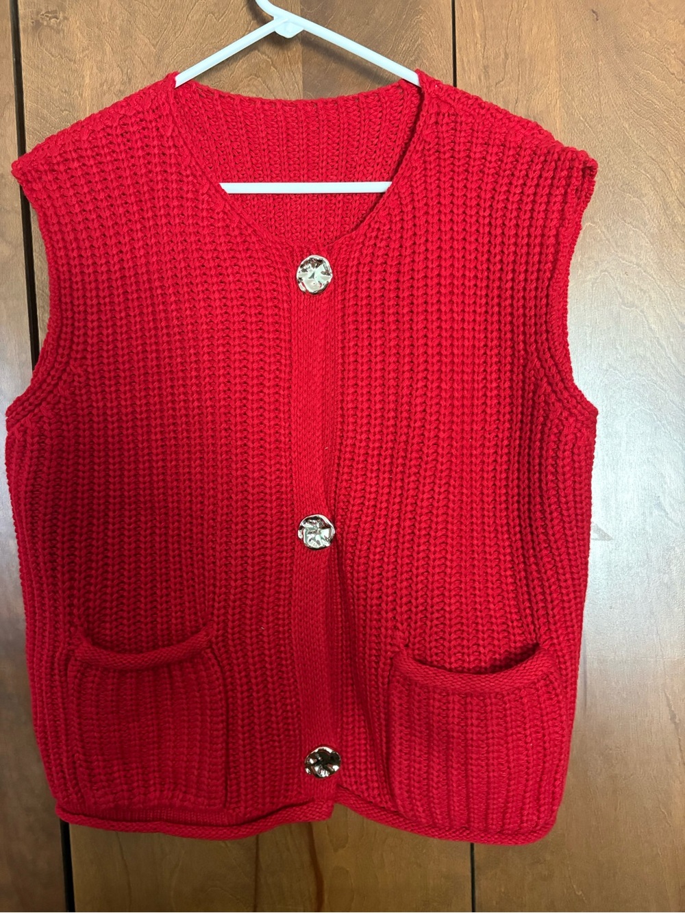 Red textured cable knit pockets buttoned up sweater vest.